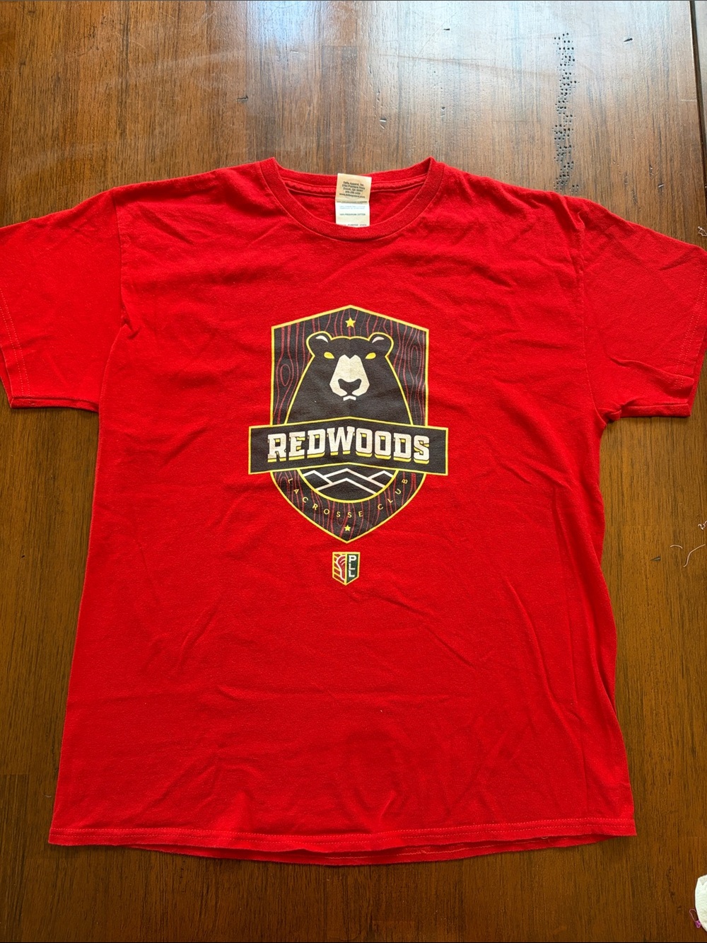 Delta Pro Weight Red Crewneck Tee with PLL Redwoods Logo